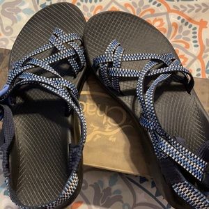 Blue, white, and black chaco’s